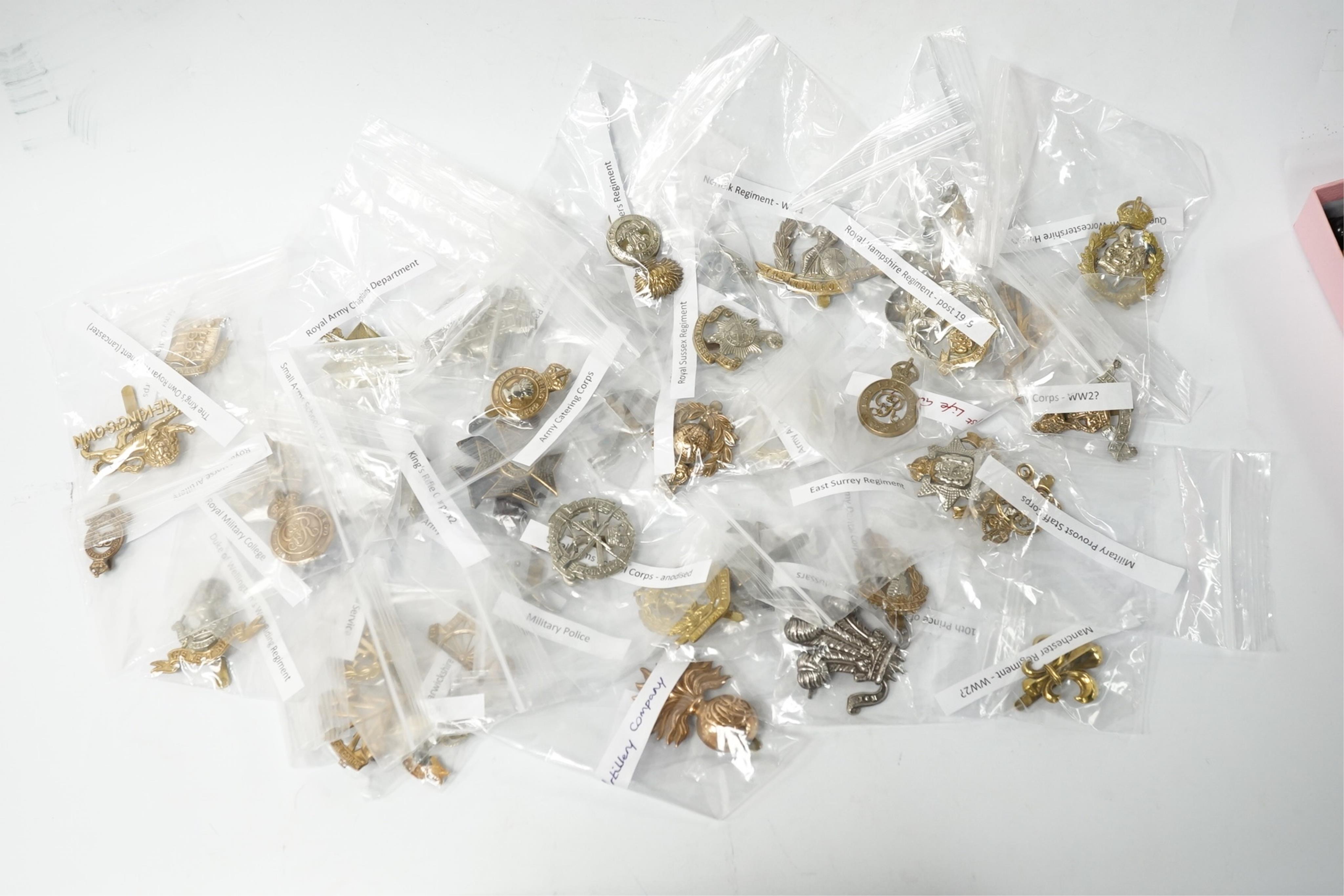 Fifty military cap badges, including; the Duke of Lancaster’s Own regiment, the Blues and Royals, Glider Pilot regiment, Sherwood Foresters regiment, Leicestershire regiment, Royal West Kent regiment, Inns of Court regim